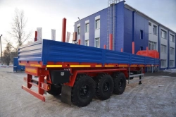 Semitrailer Politrans 94171-034. Wheel axle "Plant" 1201-2410002. Tyre 385/65R22,5. In version: platform with pneumatic cones
