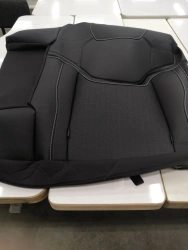 7002130XST33A8P Left rear seat backrest cover (k/black)