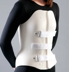 Rigid fixation corset