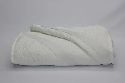 Quilted mattress covers (mattress pads) with a top made of natural, blended, synthetic fabrics with a filling made of natural, b