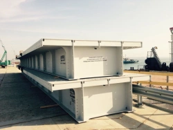 Ferrous metal bridges and bridge sections