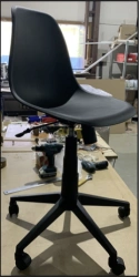 Swivel stool with solid plastic seat