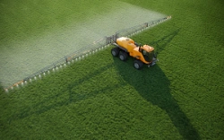 Self-propelled sprayer-spreader TUMAN-3, complete with replaceable technological equipment (boom sprayer T