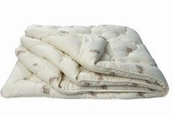 Quilted blankets made of cotton (natural) fabrics with synthetic and mixed fillings