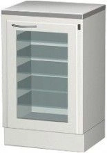 Medical cabinet for storage of sterile instruments with sliding shelves and bactericidal irradiator.