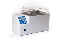 Apparatus for fast defrosting, heating and warm storage of blood, blood components, blood preparations and infusion blood.