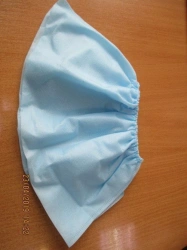 Low shoe covers included in the Set of obstetric linen for women in labour made of nonwoven material, disposable, sterile CBD "G