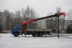 Special purpose vehicle with hydraulic loading crane of MKMA type on the basis of KAMAZ 65117 and its modifications 64K14N-UK