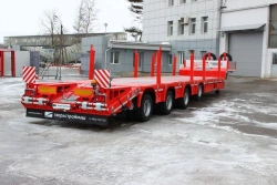 Semi-trailer Tverstroimash 993941 modification 0012 variant-platform with ramps and racks