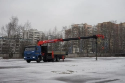 Special purpose vehicle with KMA type hydraulic loading crane on the basis of KAMAZ 65117 and its modifications 64K32N-U7