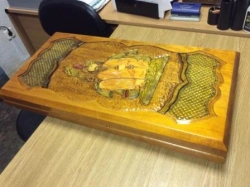 Manufacture of a set of backgammon with threads
