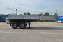 Flatbed semi-trailer of Tonar 974613 model with axles of TONAR production models: 20883, 1342.