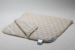 Bedding for children: quilted mattress covers with fillings made of synthetic volumetric fibre.