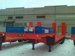 Semitrailer-heavy hauler Politrans 94161-010. In version: metal platform with straight loading platform, with flatbed platform