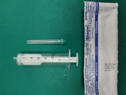 Injection syringe double-detailed single use sterile 10B "Luer" with needle.