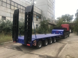 Semi-trailer heavy hauler PM 943845-0000030 with metal load platform with frame and tent with sides