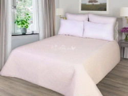 Quilted coverlets of cotton fabrics, filled with synthetic fibres.