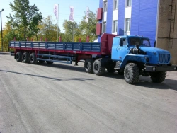 Semitrailer Politrans 94171-0000020. In version: metal platform with decking, with spring suspension.