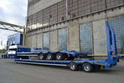 Semitrailer-heavy hauler Politrans 94182-010. In the version: metal platform with a loading platform, with ladders, with flatbed