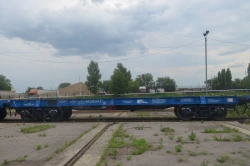 Flat wagon for transporting sawn timber and round timber model 13-9997