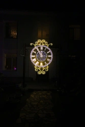 Illumination frame "Clock" - decorative street lamp, installed as an independent stationary object.