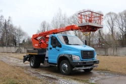 Self-propelled boom lift with working platform PSS-131.18E with all-metal box section boom on chassis base