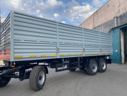 Tipper trailer with side discharge type 85335, modification 853352. Metal tipper body of square cross-section with tipping.