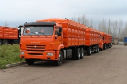 Flatbed truck type AZC1030 of modification 533912 on chassis KAMAZ 65115-RR