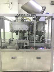 Automatic line with capacity up to 3000 bottles/hour for PET containers, capacity up to 10 litres as a part of: YUWEST-4,0 BNM-5
