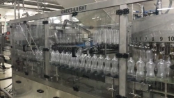 Automatic line, capacity up to 8000 bottles/hour for PET and glass containers, capacity up to 2 litres in composition: YUVEST-UP