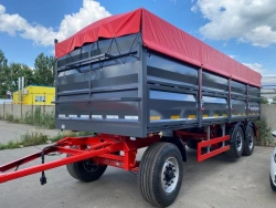 Grain wagon trailer type 85335, modification 853351. Metal flatbed platform with front fixed board, rear and side boards.