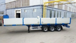 Semitrailer Politrans 94171-026. In version: metal platform with decking, with boards, with cones, with modulator, on pneumatic