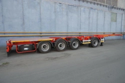 Semitrailer Politrans 94164-060. In design: one-piece frame with devices for fixing and securing of containers, on pneumatic tip