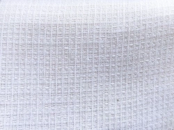 Bleached cotton waffle towelling fabric article C 42 BJU