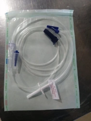 Gravity enteral feeding administration kit without a bag
