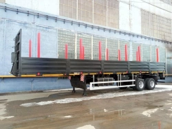 Semitrailer Politrans 9417-050. In the version: metal platform with decking, with sides, with racks (cones), with devices.