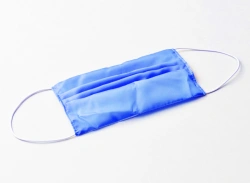 Mask with elastic bands from the set of medical isolating clothing reusable non-sterile