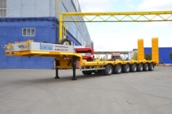 Semitrailer-heavy hauler Politrans 94187-0000065. In the version of metal sliding platform with a loading platform, with ladders