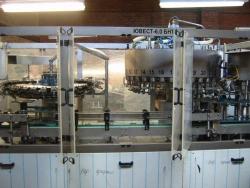 Automatic line, capacity up to 6000 bottles/hour for PET and glassware, capacity up to 2 litres, consisting of: YUWEST-6,0 BNT;