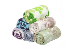 Coverlets (plaids) of synthetic pile knitted fabrics (fleece) of trade mark TC Bagira
