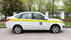 Car exclusively for transporting disabled persons, type GRNT, modification GRNT1J of category M1, on the basis of LADA vehicle t