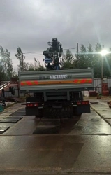 Special purpose vehicle with hydraulic loading crane of KMA type on the basis of URAL 4320 and its modifications U0K00N-4L150