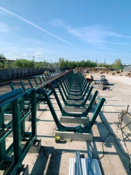 Sorted log dumping and stacking module with AXEL 11-2 drive station