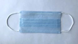 Medical disposable masks of nonwoven materials (??15/???25/??15) non-sterile three-layer, density 55g/m2, blue