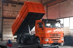 Dumper truck type AZC1030 of modification 533910 on chassis KAMAZ 65115-A5, 65115-50, 65115-rr, 65117-rs