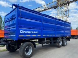 Grain wagon trailer type 85335, modification 853351. Metal flatbed platform with folding rear and side walls.