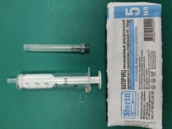 Injection syringe two-detail single use sterile 5B "Luer" with needle.