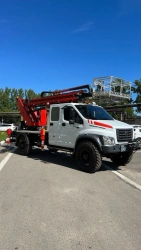 Self-propelled boom lift PSS-131.18E (C42A43) 71-TV on Sadko-Next "Red Machine" chassis