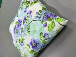Pillow made of cotton fabrics filled with artificial swan fluff.
