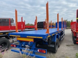 Semitrailer Politrans 9417-011. In the version: metal platform with decking, with pneumatic suspension. Axles manufactured by Pl